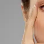 close up of beautiful young woman face and eyes